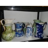 A mixed lot of jugs including blue and white, COLLECT ONLY.