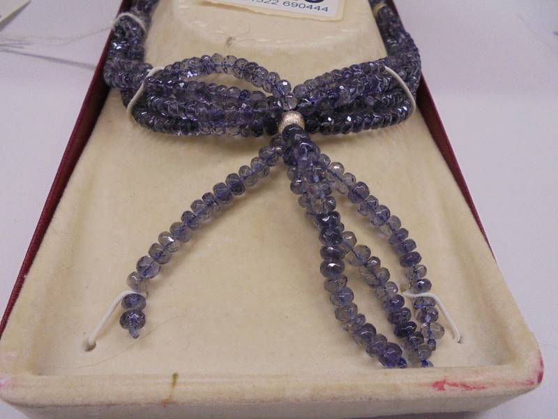 A tanzanite natural stone four strand necklace with silver tassle. - Image 2 of 2