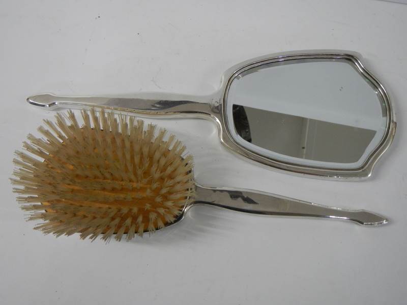 A silver backed hand mirror and a silver backed hair brush. - Image 2 of 2