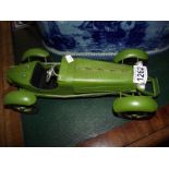 A green pressed steel model of a 1930's racing car Length 35cm