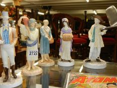 Five assorted Royal Worcester figurines.