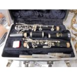 A cased Selmer 'Bundy' clarinet.