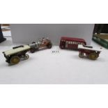 A Corgi Chitty Chitty Bang Bang car (complete) a Hornby Thomas bus and two Lesney traction engines.