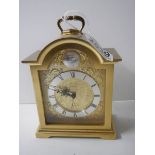 A heavy brass Swiss made clock. in working order.