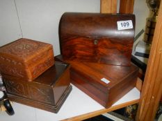 A dome top box and three others.