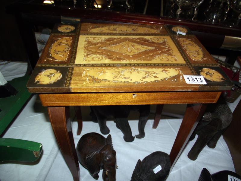 An Italian inlaid musical side table 37cm x 27cm x 43cm