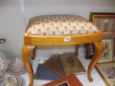 A 1930's piano/dressing table stool