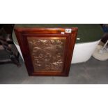 A framed hammered copper plaque depicting birds 29cm x 39cm frame 43cm x 62cm COLLECT ONLY