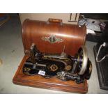 A vintage cased Singer sewing machine COLLECT ONLY