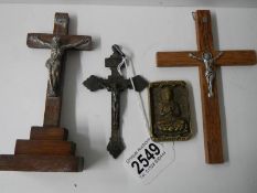 Three Crucifixes and an early bronze Buddha token.