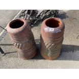 2 terracotta Aztec style chimney planters