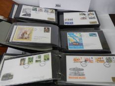 Three albums of in excess of 120 first day covers.