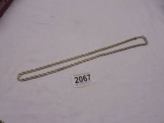 A 50 cm silver neck chain,