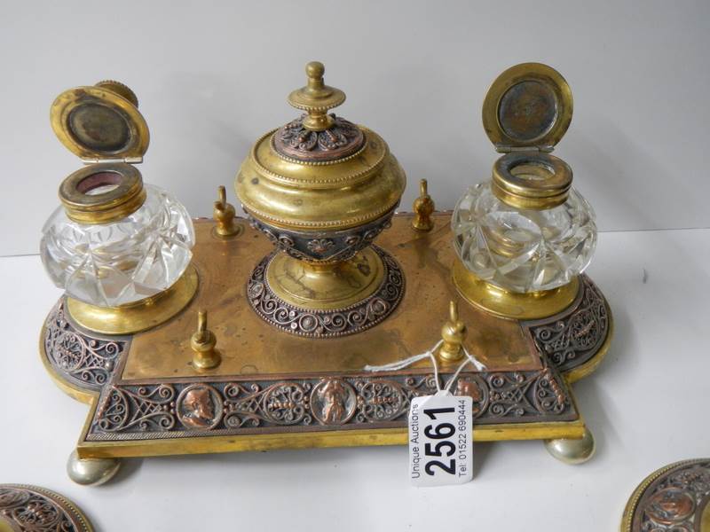 A late Victorian gilt bronze desk stand with matching inkwells and candlesticks. - Image 3 of 7