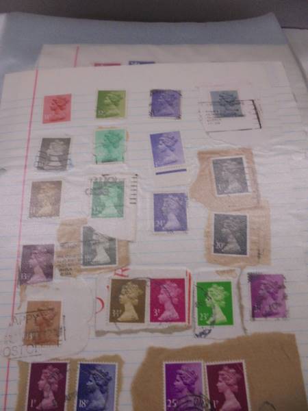 A large folder of UK stamps up to 2000 and a large folder of world stamps. - Image 17 of 17