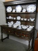 A late Victorian oak open rack dresser by Thomas Clark & Son, COLLECT ONLY.