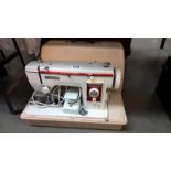 A New Home sewing machine in case, COLLECT ONLY