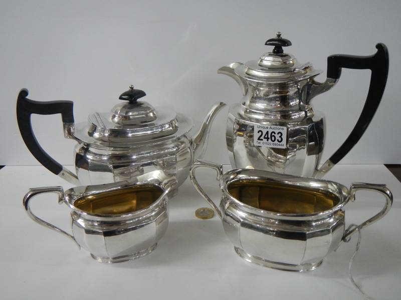 A four piece silver plate tea set.