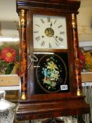 A Victorian American wall clock, in working order. COLLECT ONLY.