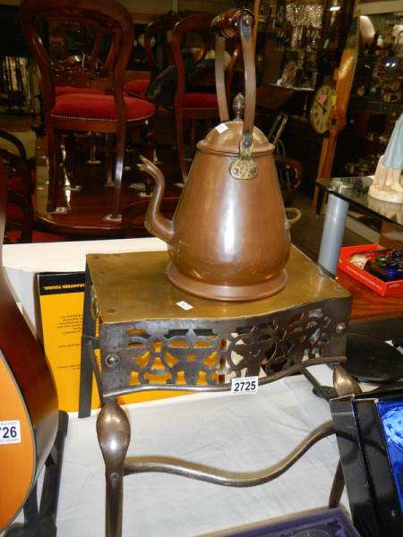 A Victorian brass topped footman and a copper water jug. COLLECT ONLY.