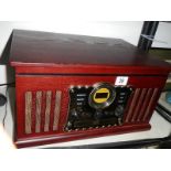 A 20th century record player / radio. COLLECT ONLY.