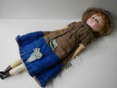 A Victorian wax headed doll.