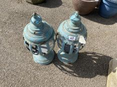 2 plae blue metal outside lamps