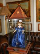 A good quality 20th century doll in architectural style case. COLLECT ONLY.