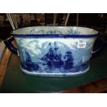 A large blue and white pottery footbath planter depicting ships COLLECT ONLY