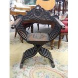 A Victorian carved 'X' shaped hall chair, COLLECT ONLY.