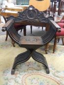 A Victorian carved 'X' shaped hall chair, COLLECT ONLY.