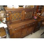 A 1930's oak sideboard with leaded glass doors COLLECT ONLY