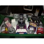 A good lot of candles, including Yankee, (used but lots of burning hours left) plus scented