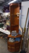 A 1970's teak corner unit