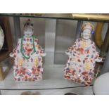 A pair of Chinese figures.