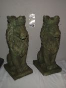 A pair of green verdigree cement garden lions height 36cm COLLECT ONLY
