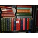 A mixed lot of old books including Dickens.
