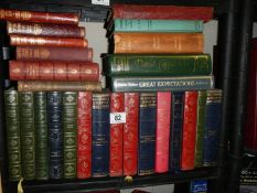 A mixed lot of old books including Dickens.