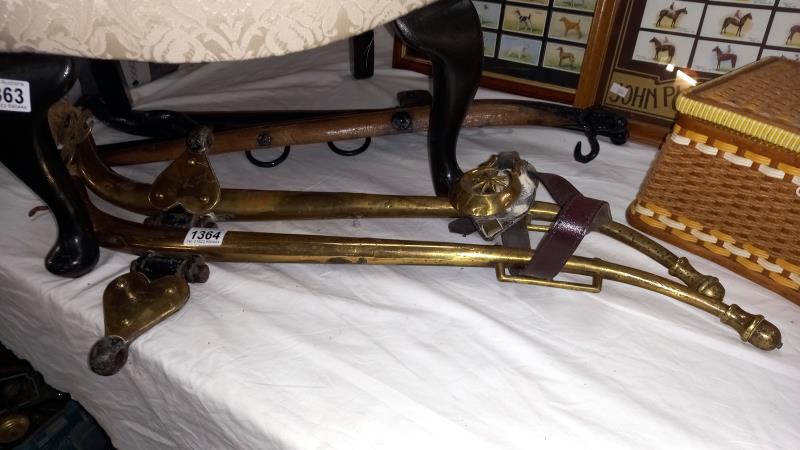A pair of Victorian solid brass horse hames and an iron and wooden set COLLECT ONLY