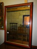 A mahogany framed bevel edged mirror.