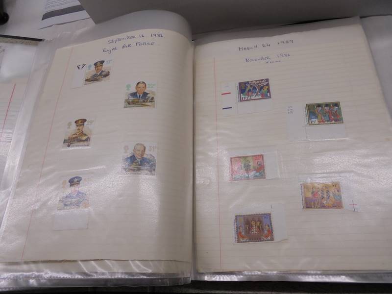 A large folder of UK stamps up to 2000 and a large folder of world stamps. - Image 14 of 17
