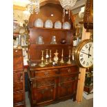 An oak arched top dresser with linen fold doors, COLLECT ONLY.