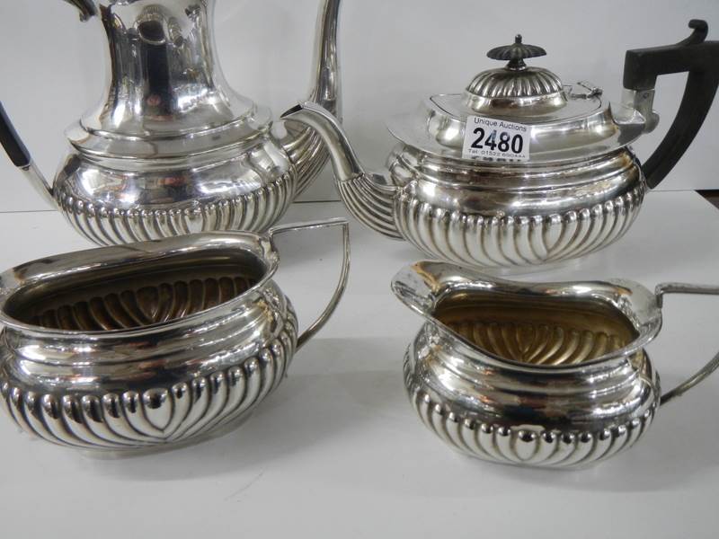 A four piece silver plate tea set. - Image 3 of 3