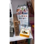 A quantity of 'new' baby items including baby monitor, fisher price toy, etc COLLECT ONLY