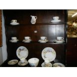 Approximately 32 pieces of hand painted tea ware, COLLECT ONLY.