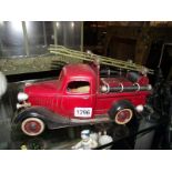 A well detailed pressed steel model of a 1930's Ford fire engine length 34cm