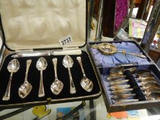 A cased dessert spoon set and a cased set of six teaspoons.