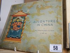 An early 20th century copy of 'Adventures in China' including coloured plates.