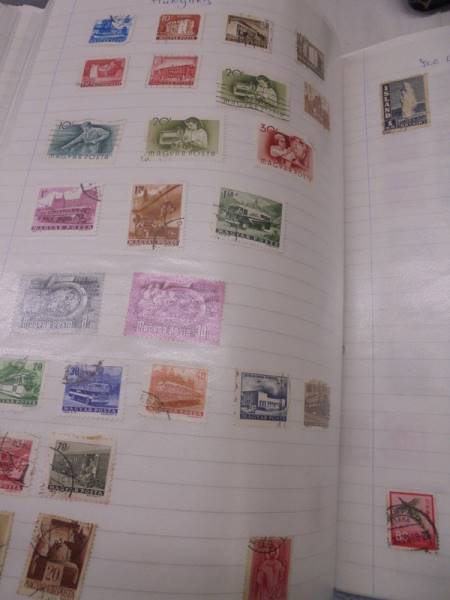 A large folder of UK stamps up to 2000 and a large folder of world stamps. - Image 5 of 17