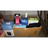 A quantity of 'new' items in boxes including rechargeable torches, water bottle, camping lamp,